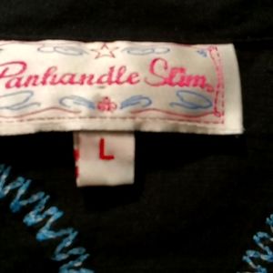 A Button Down Womans Western pre-owned Shirt.